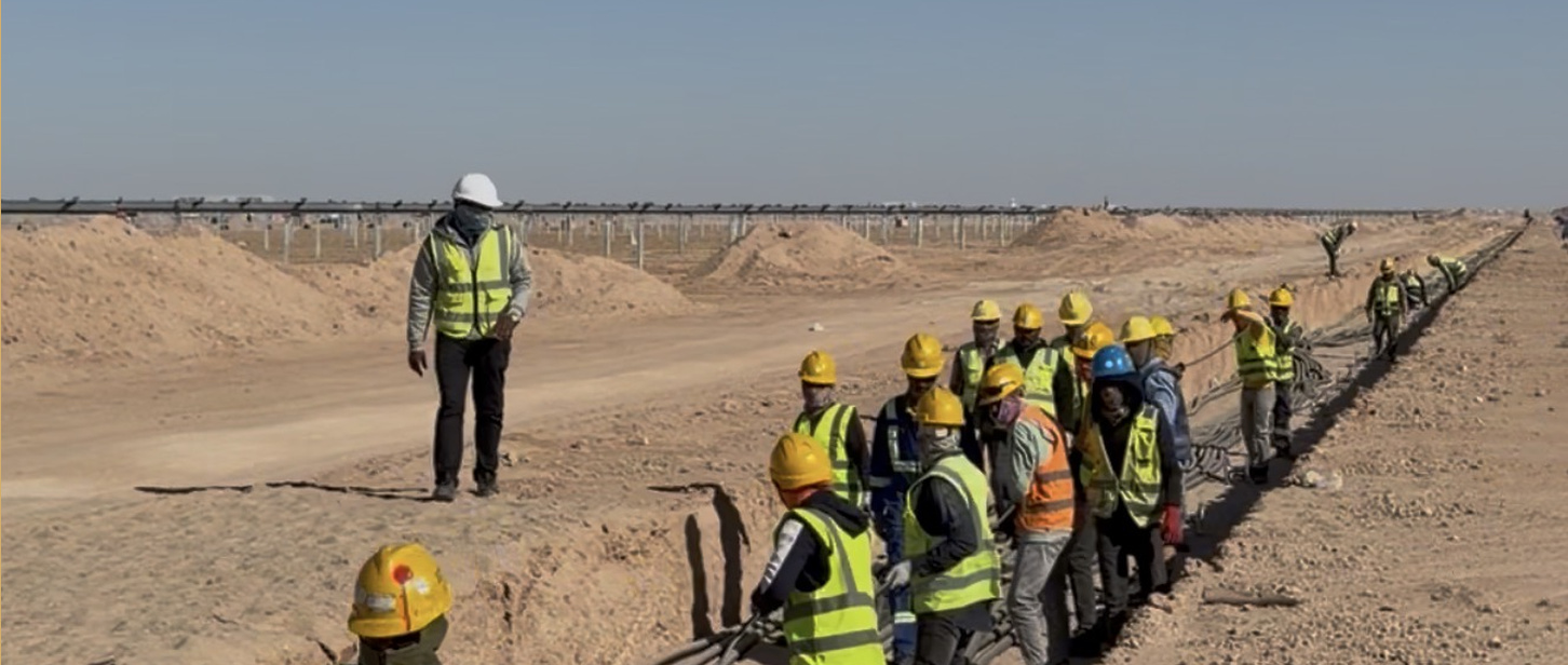 Construction team working on cable installation